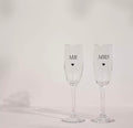 AMORE BY JULIANA® champagneglazen set ‘Mr & Mrs’ met zilverkleurige hotfoil en hartsymbool – perfect huwelijkscadeau